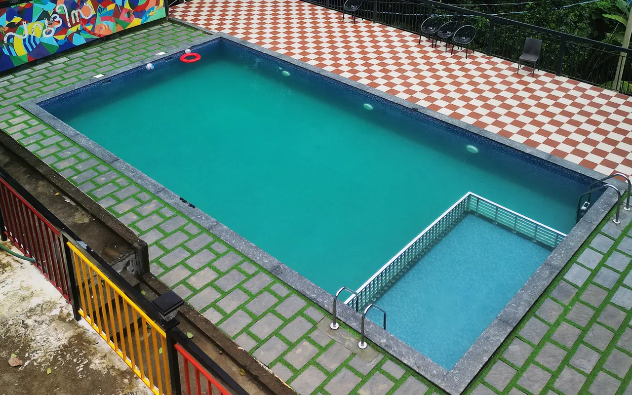 Luxury hilltop resort swimming pool in Munnar